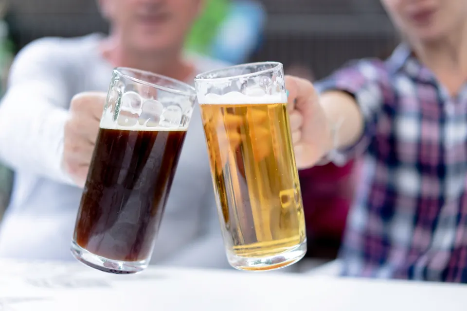 Illustrative photograph of two beer steins; not this event or an included drink.